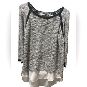 Black and white layered long sleeve sweater with a touch of sparkle.